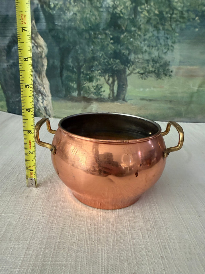 Mid Century handmade Turkish copper bucket planter featuring brass twin handles.