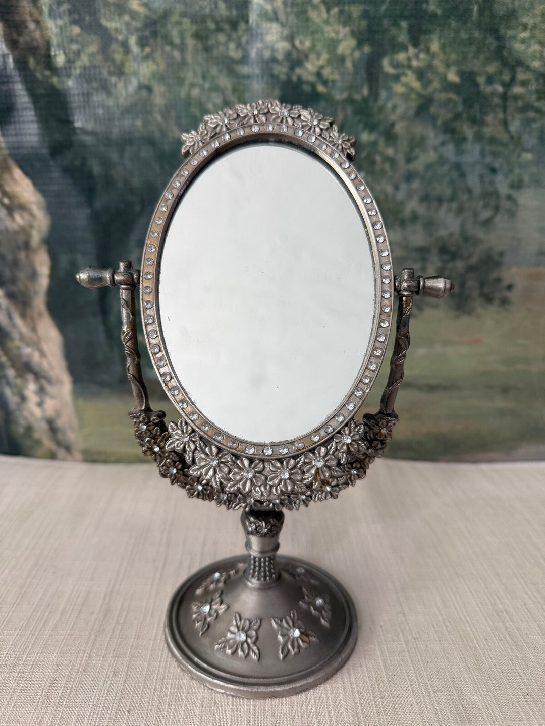 Ornate oval tabletop vanity mirror