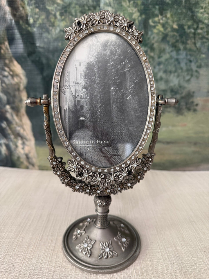 Ornate oval tabletop vanity mirror