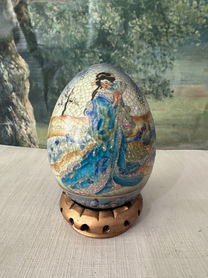 Decorative egg with stand
