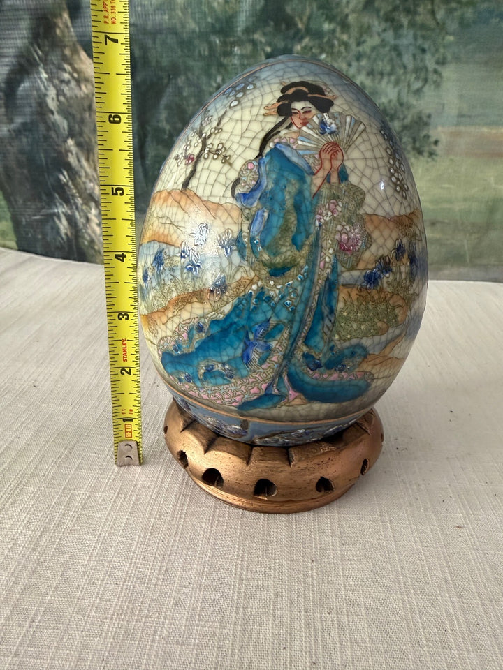 Decorative egg with stand