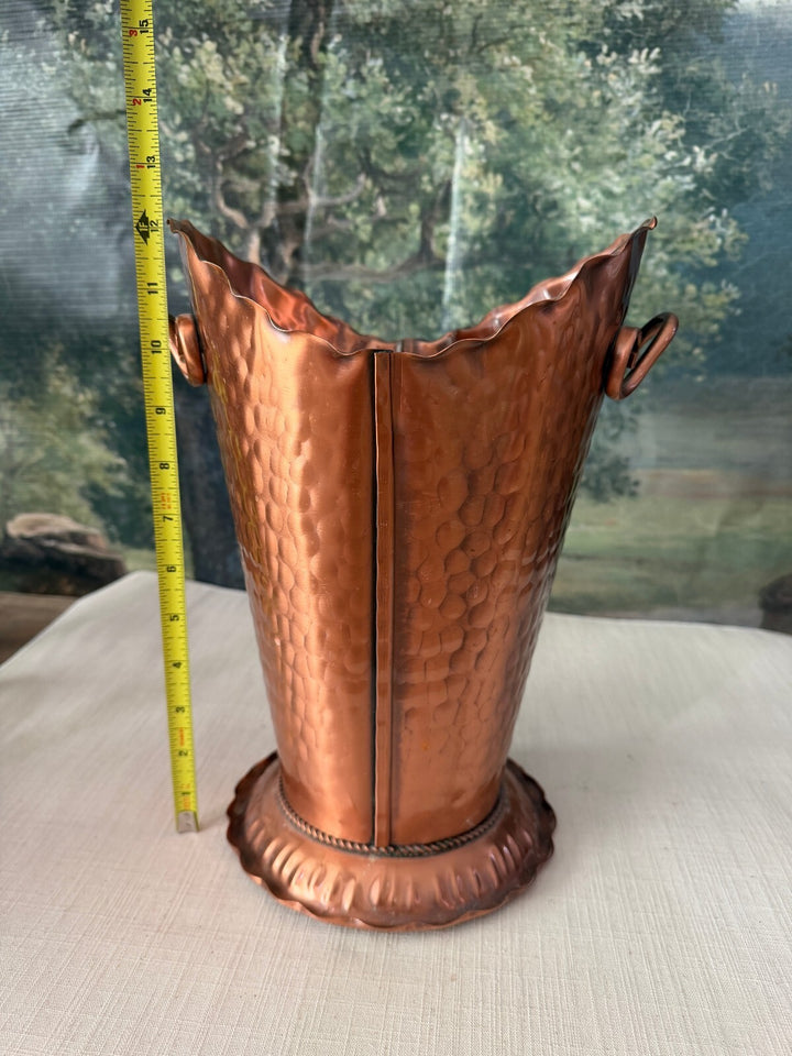 Hammered copper vase with scroll handles