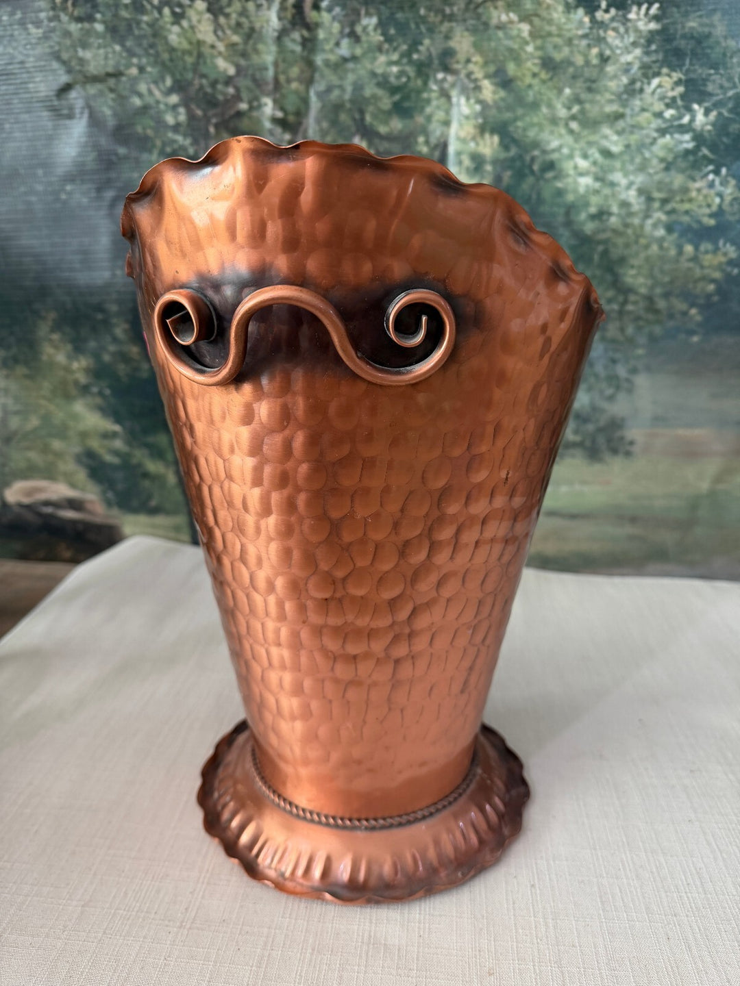 Hammered copper vase with scroll handles