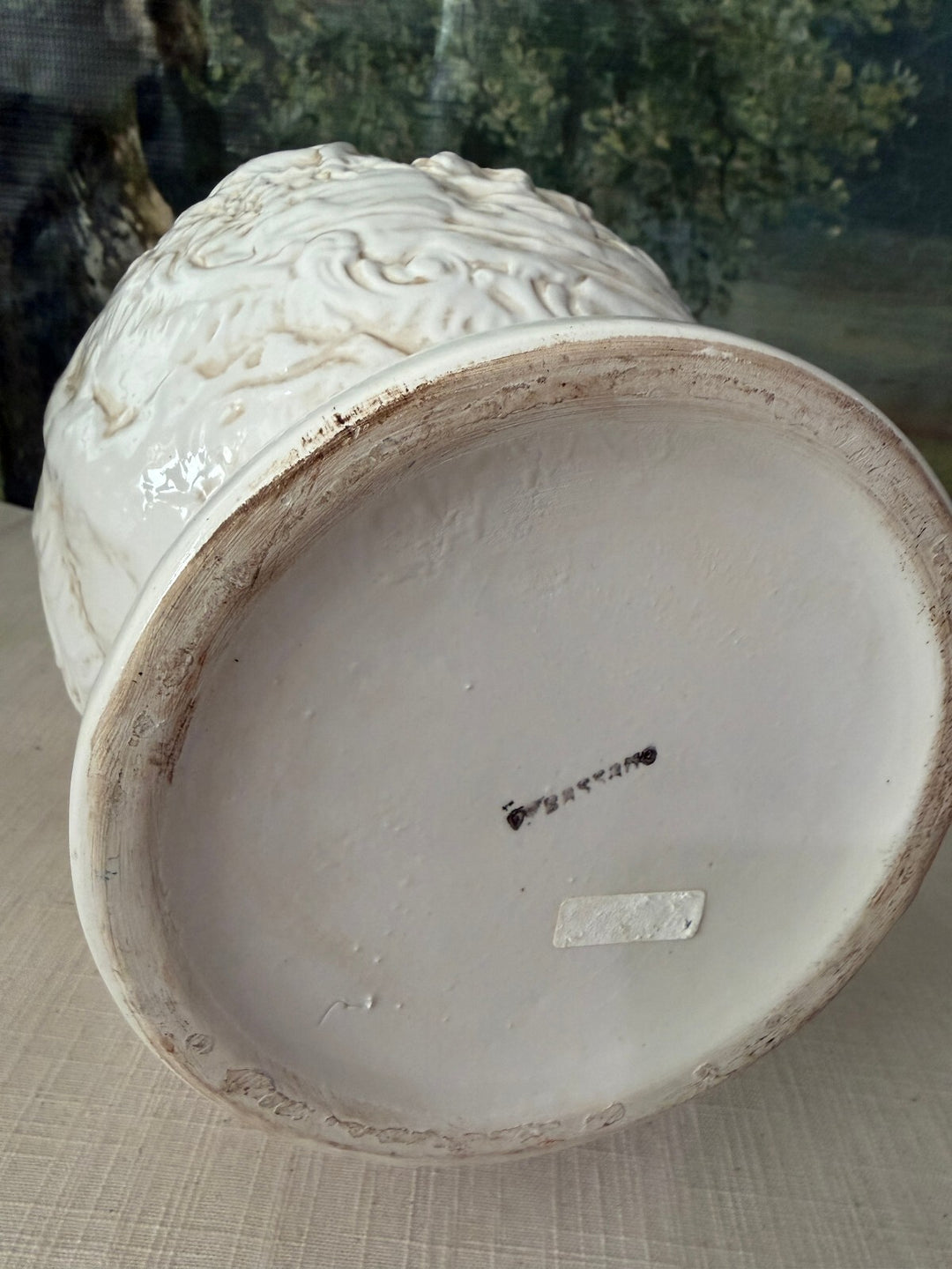 White relief ceramic vase