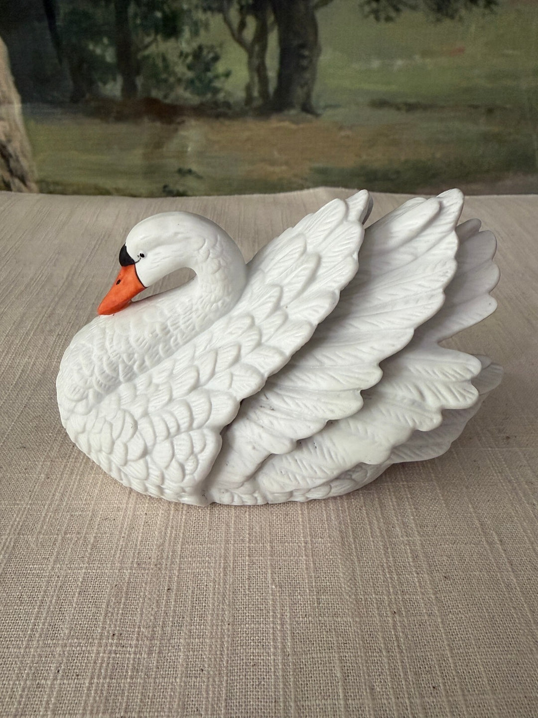 Small white porcelain swan figurine