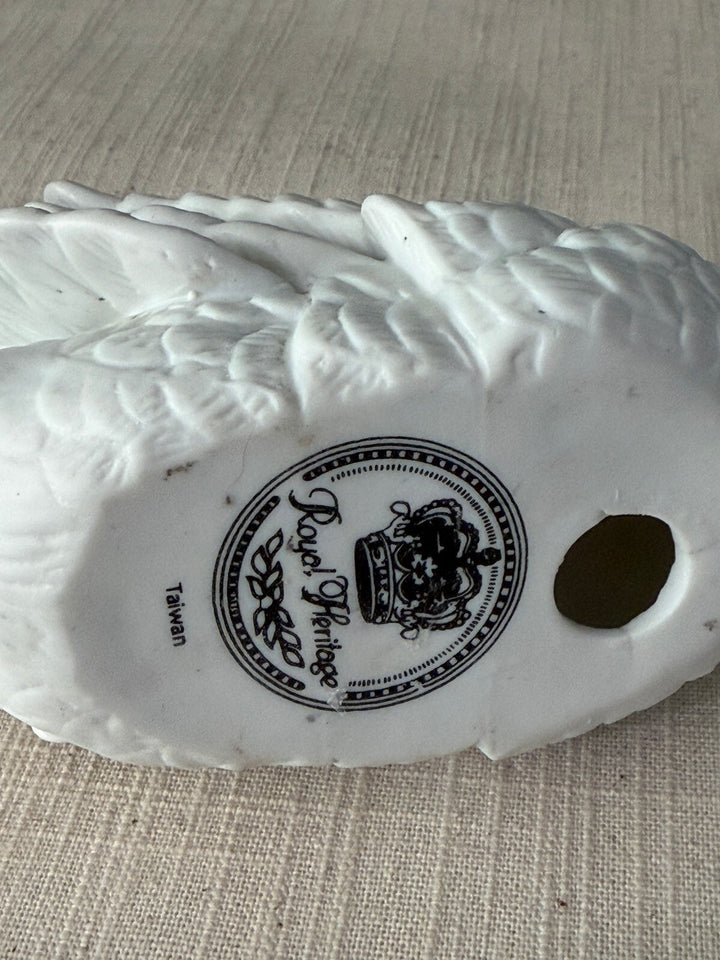 Small white porcelain swan figurine