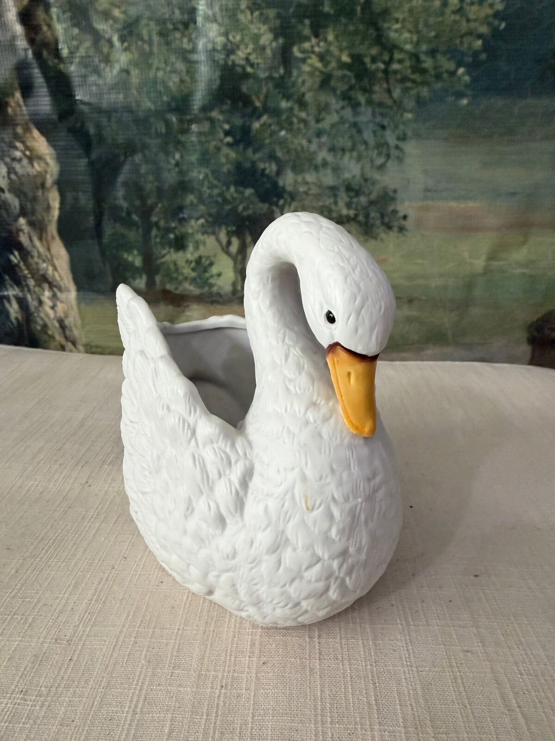 White ceramic swan planter