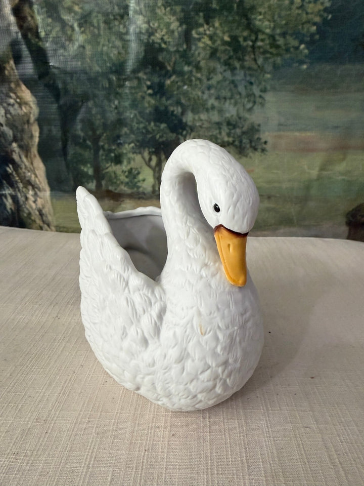 White ceramic swan planter