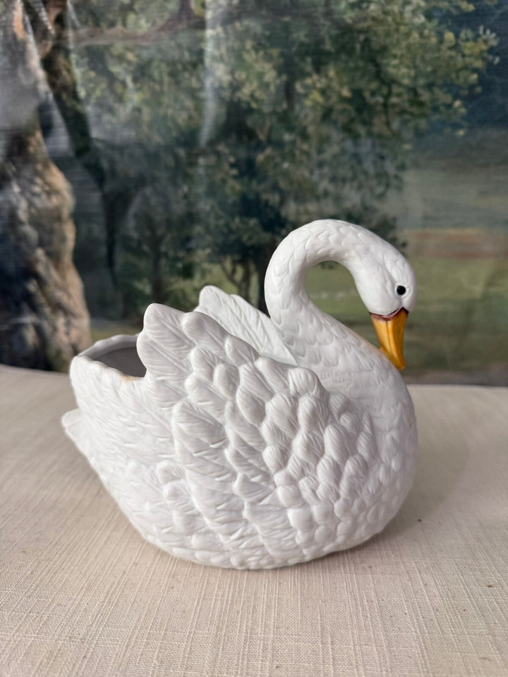 White ceramic swan planter