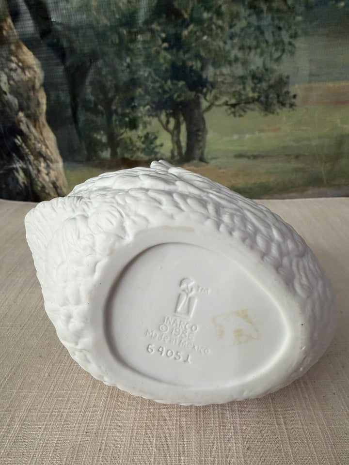 White ceramic swan planter