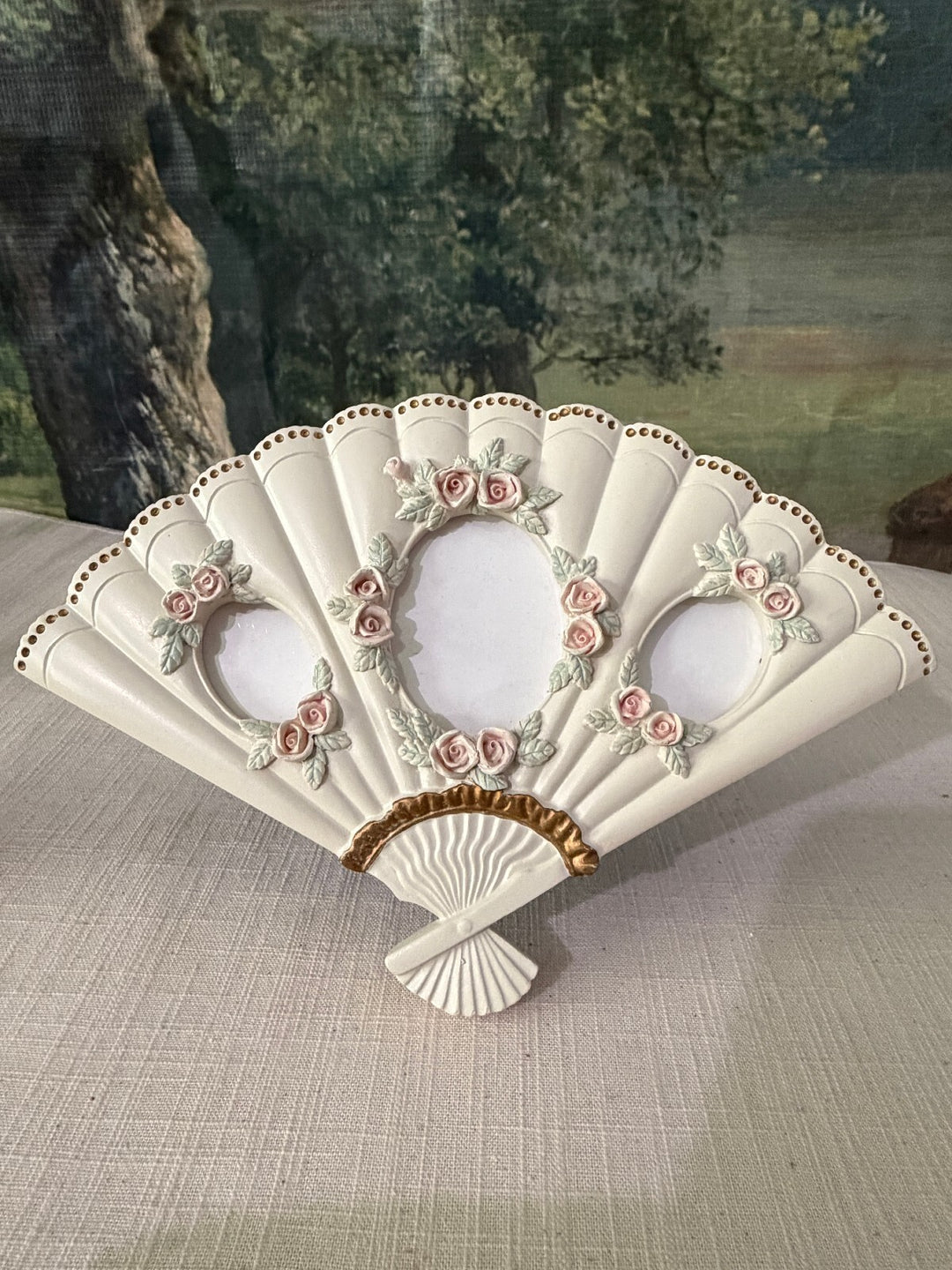 Fan shaped floral triple opening picture frame