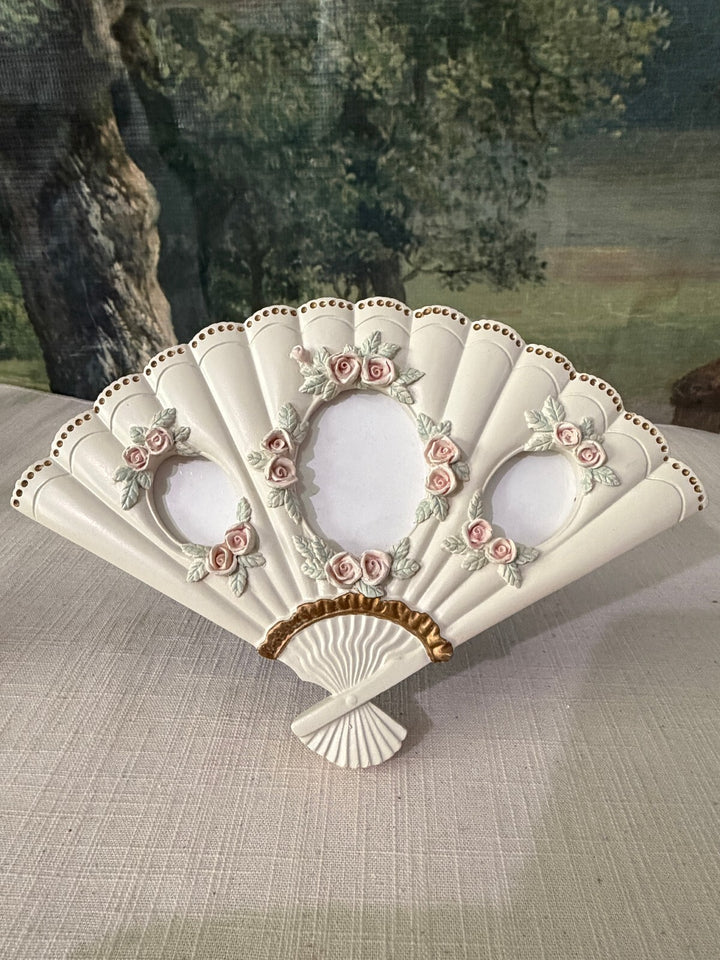 Fan shaped floral triple opening picture frame