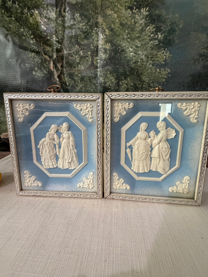 Blue and white relief wall plaques set of 2