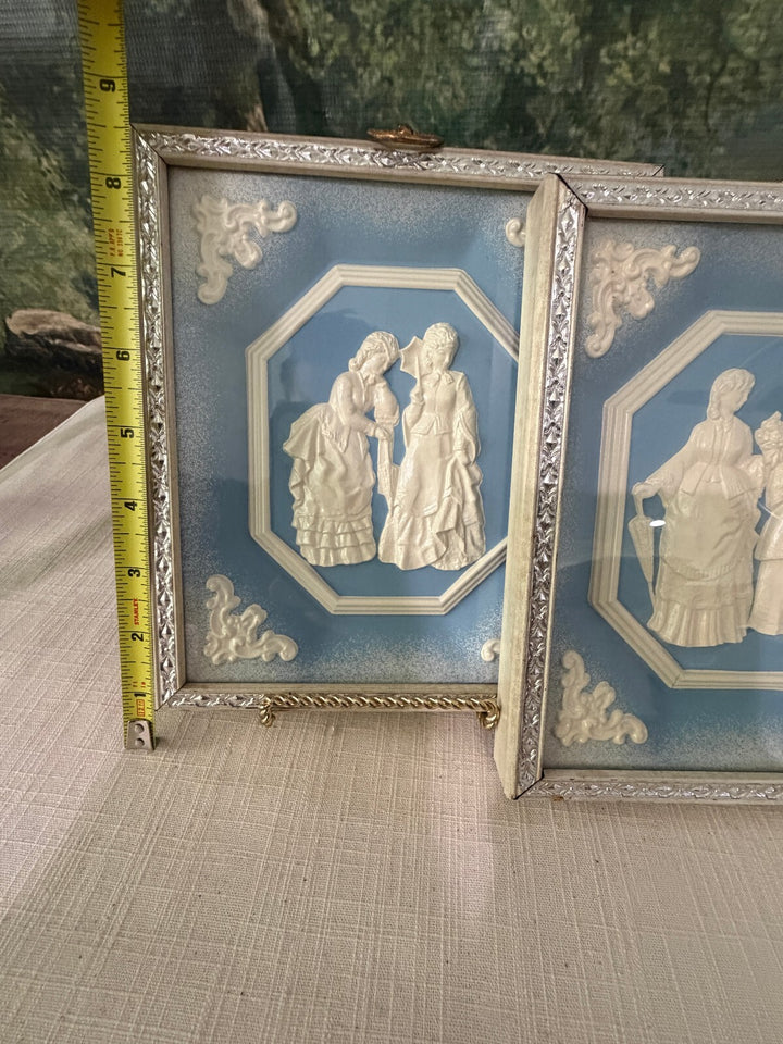 Blue and white relief wall plaques set of 2