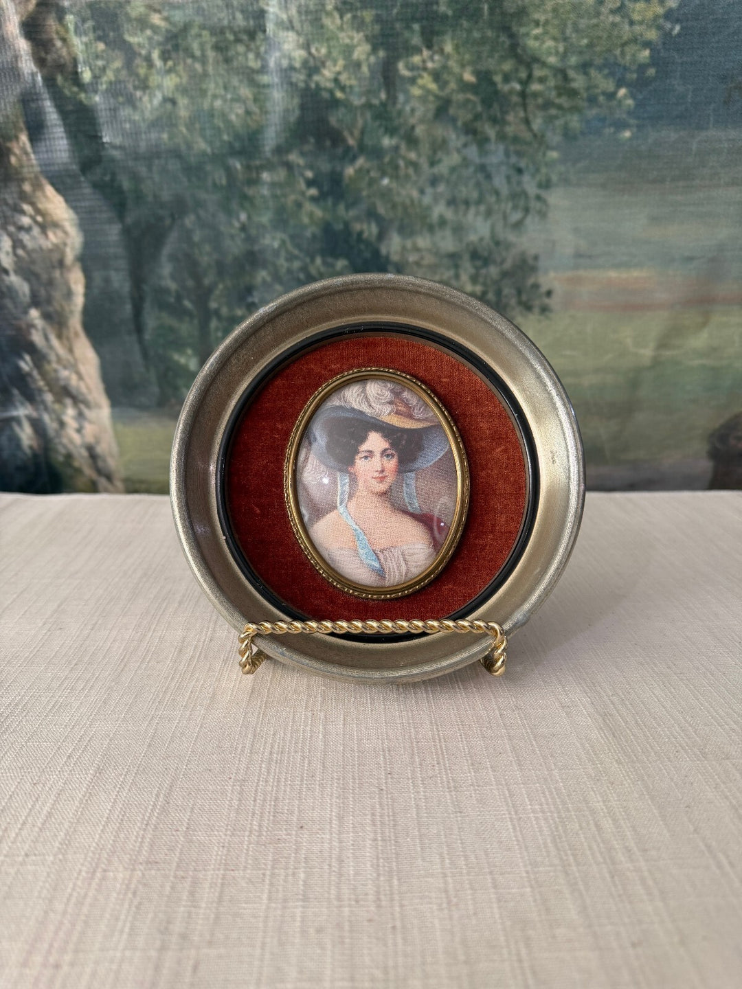 Set of 4 round framed portrait miniatures