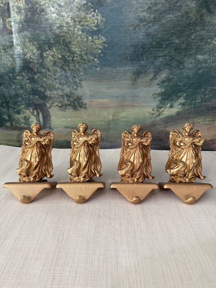 Set of 4 gold iron cast tone angel stocking holder