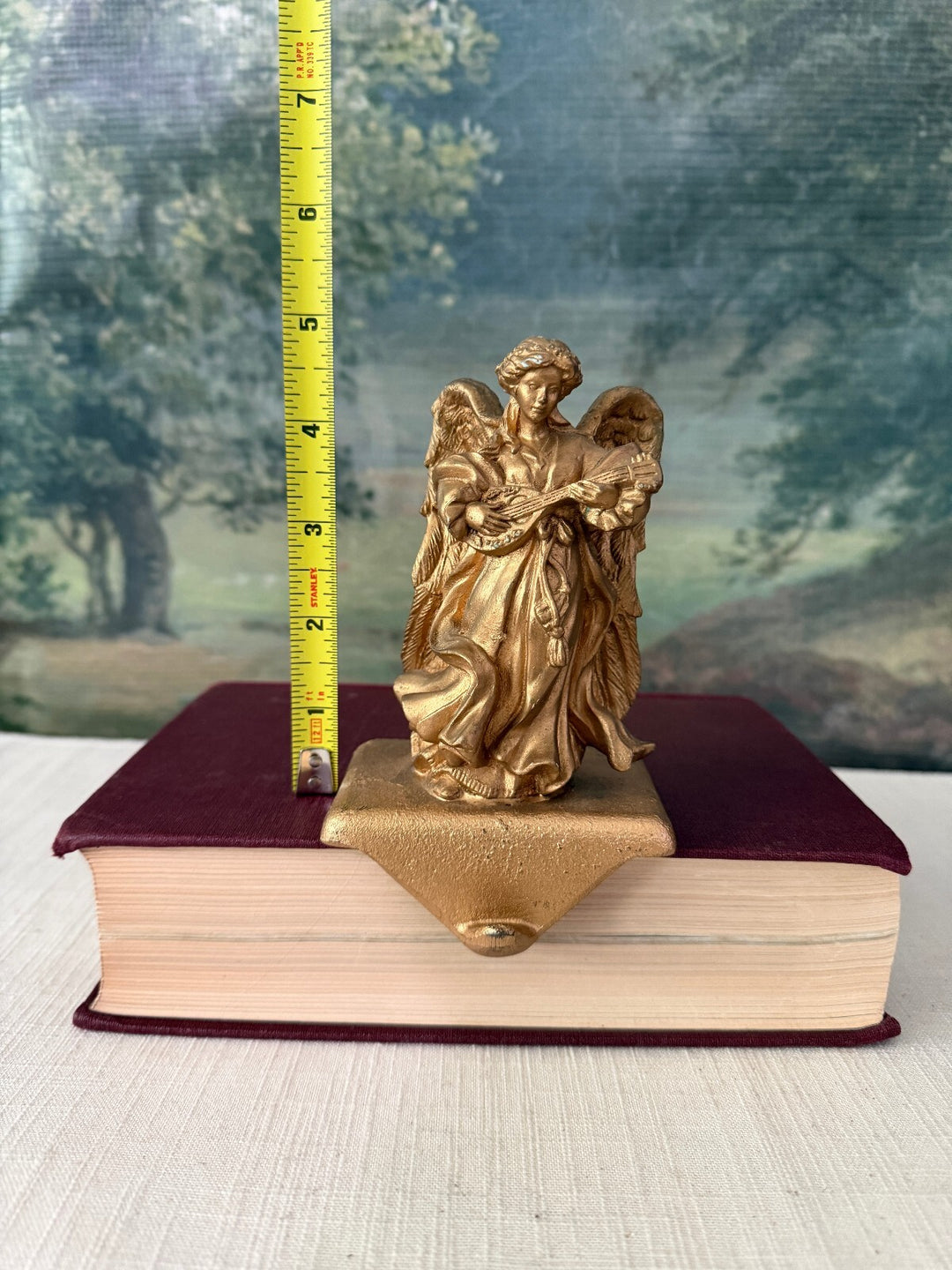 Set of 4 gold iron cast tone angel stocking holder