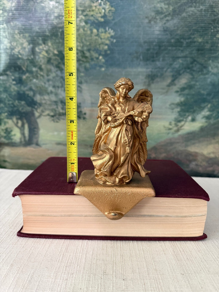Set of 4 gold iron cast tone angel stocking holder