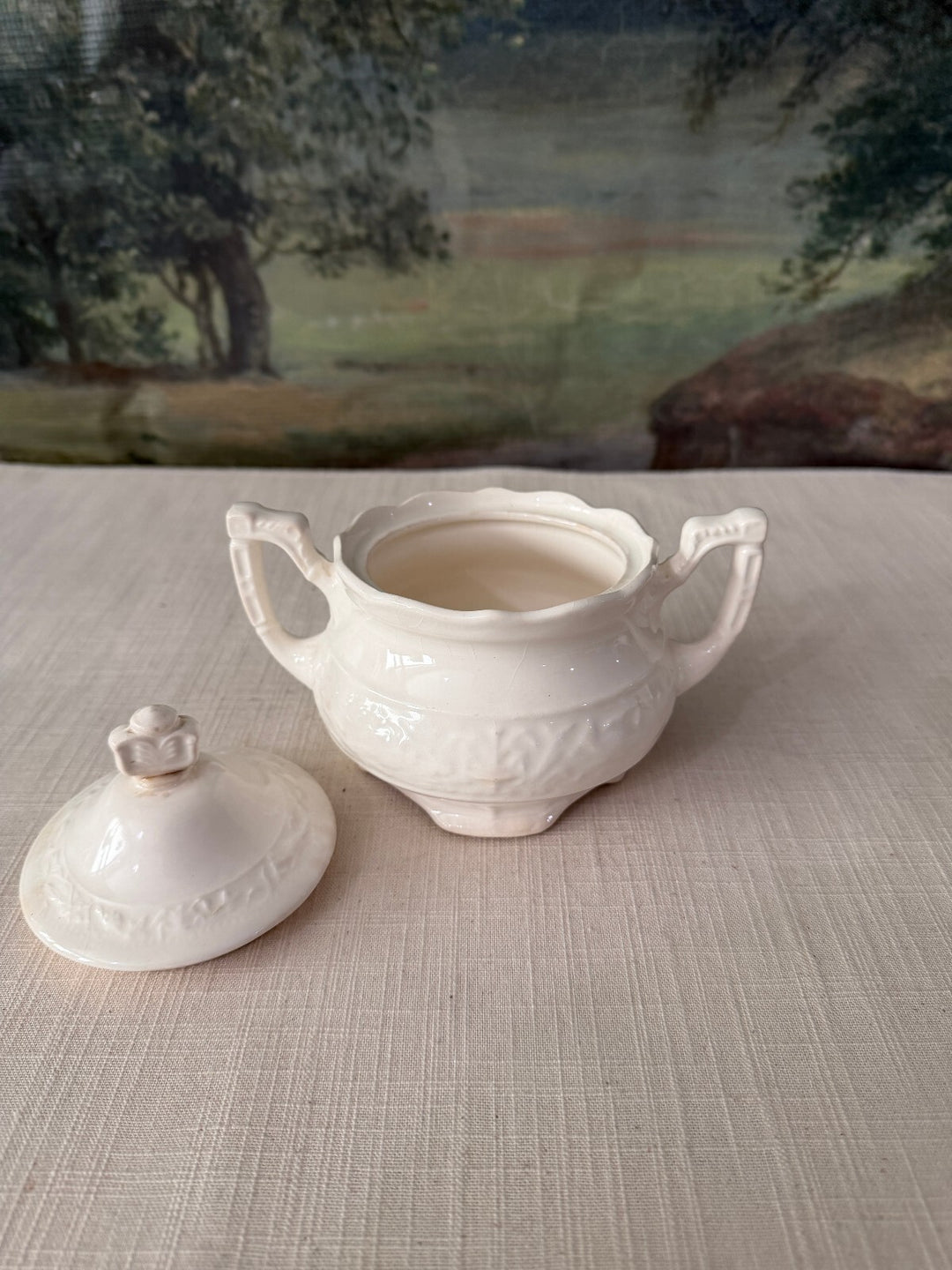 White ceramic sugar bowl and creamer set