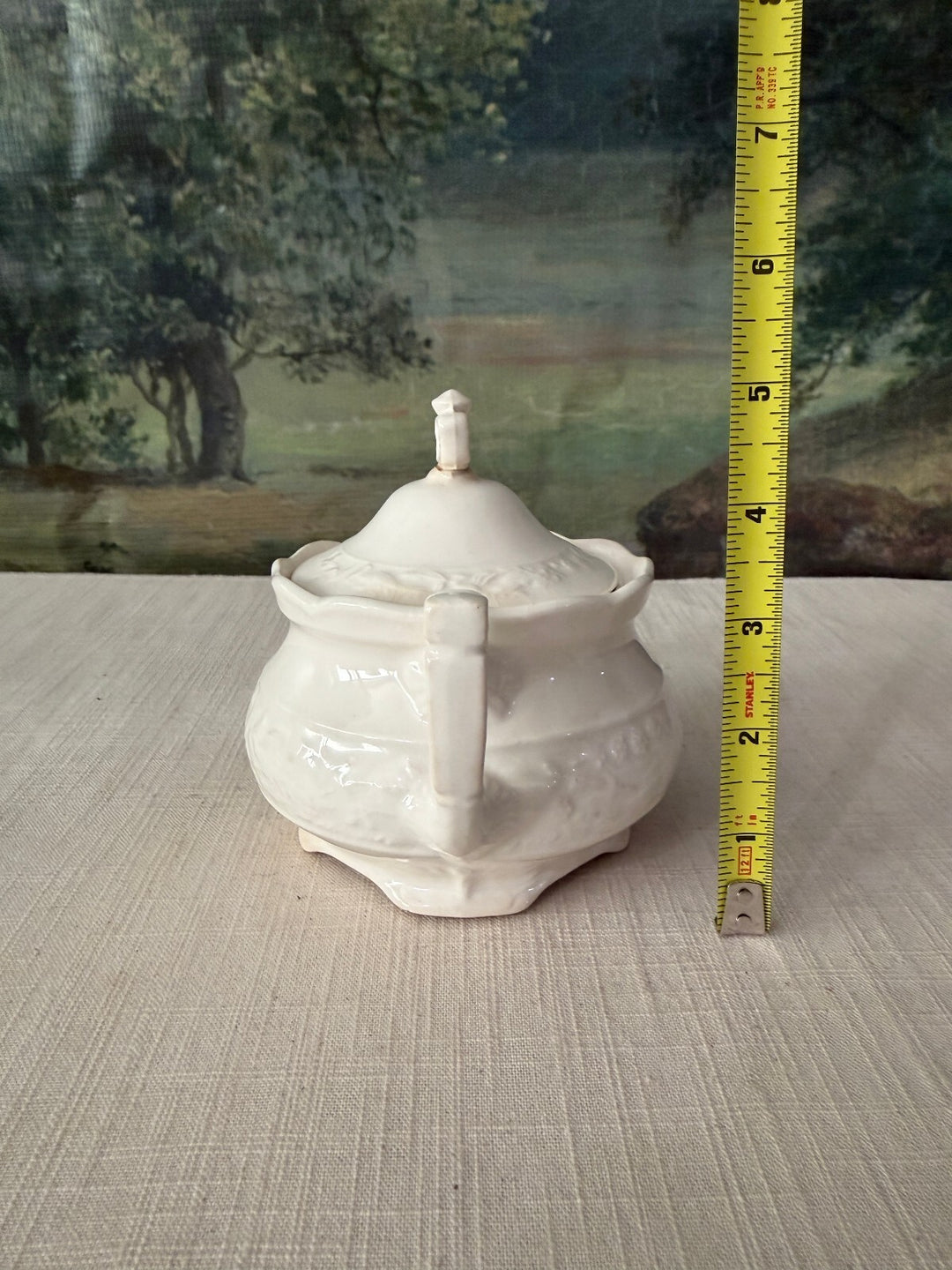 White ceramic sugar bowl and creamer set