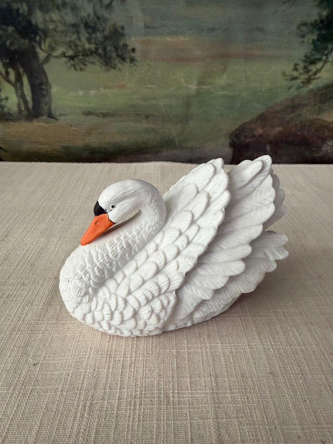 White swan ceramic figurine