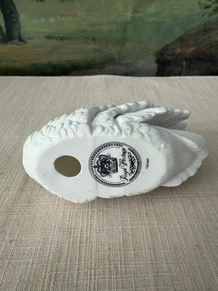 White swan ceramic figurine