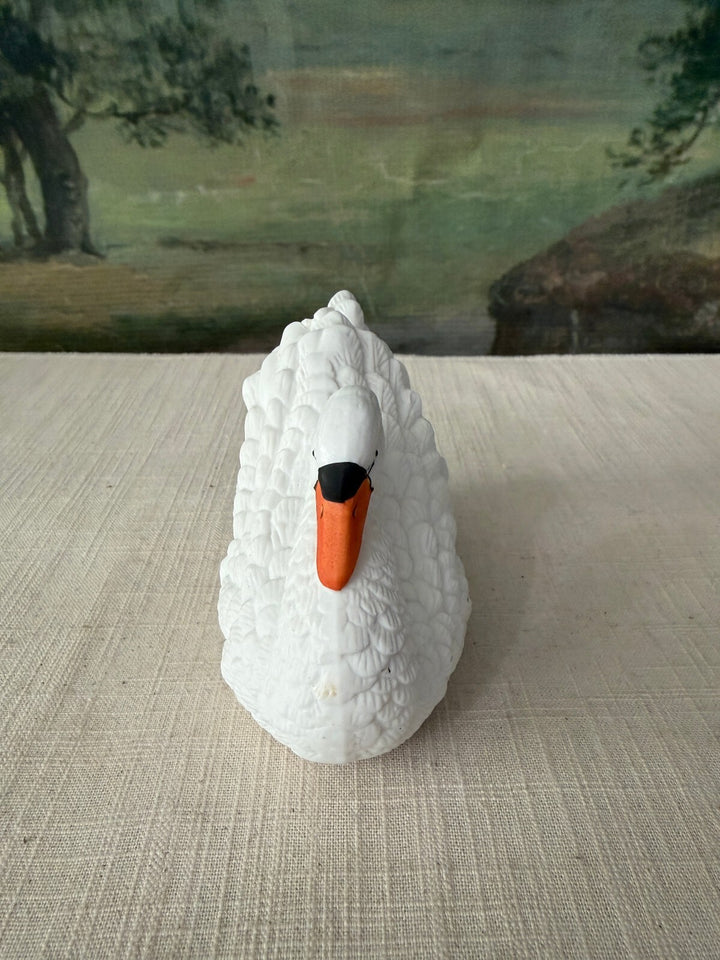 White swan ceramic figurine