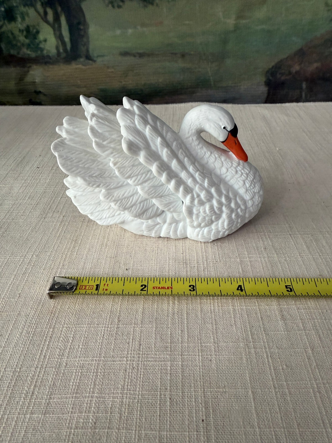 White swan ceramic figurine