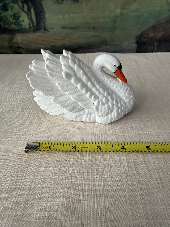 White swan ceramic figurine
