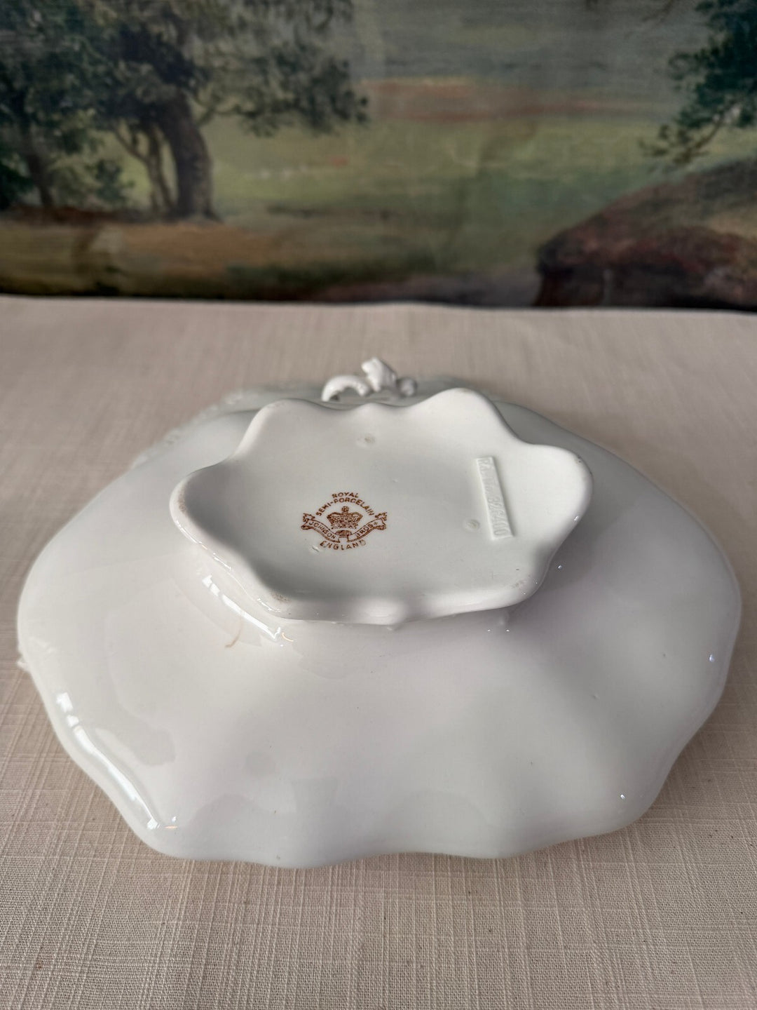 White covered serving dish with handles