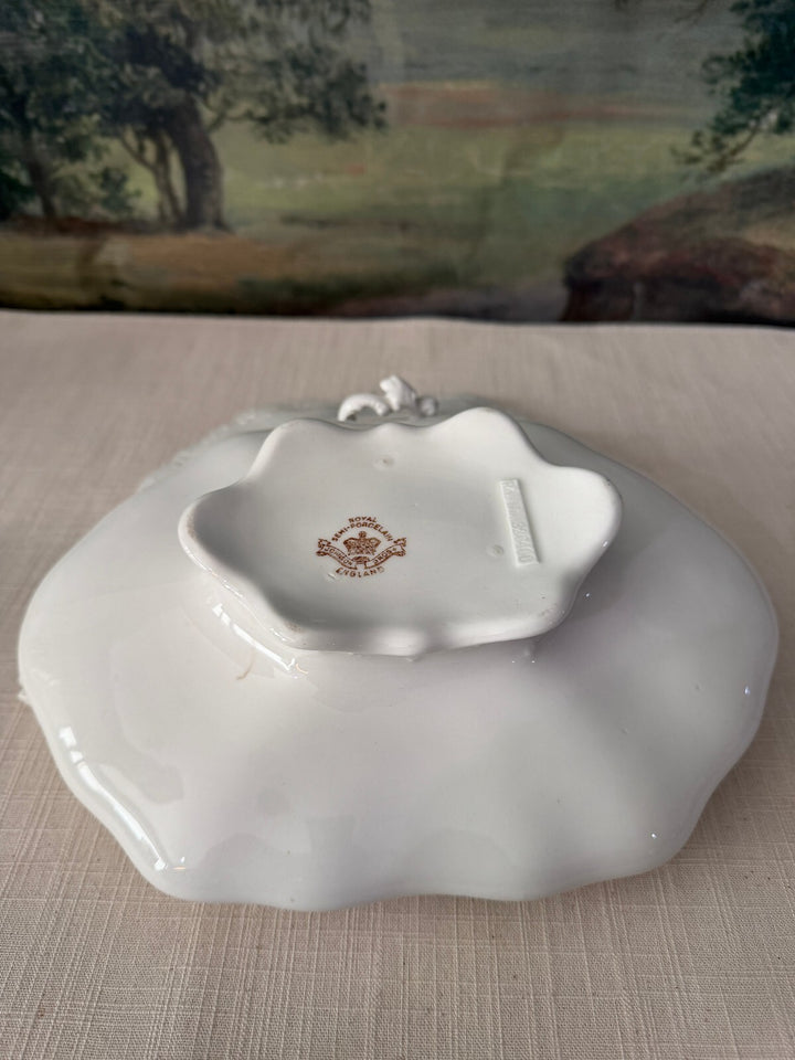 White covered serving dish with handles
