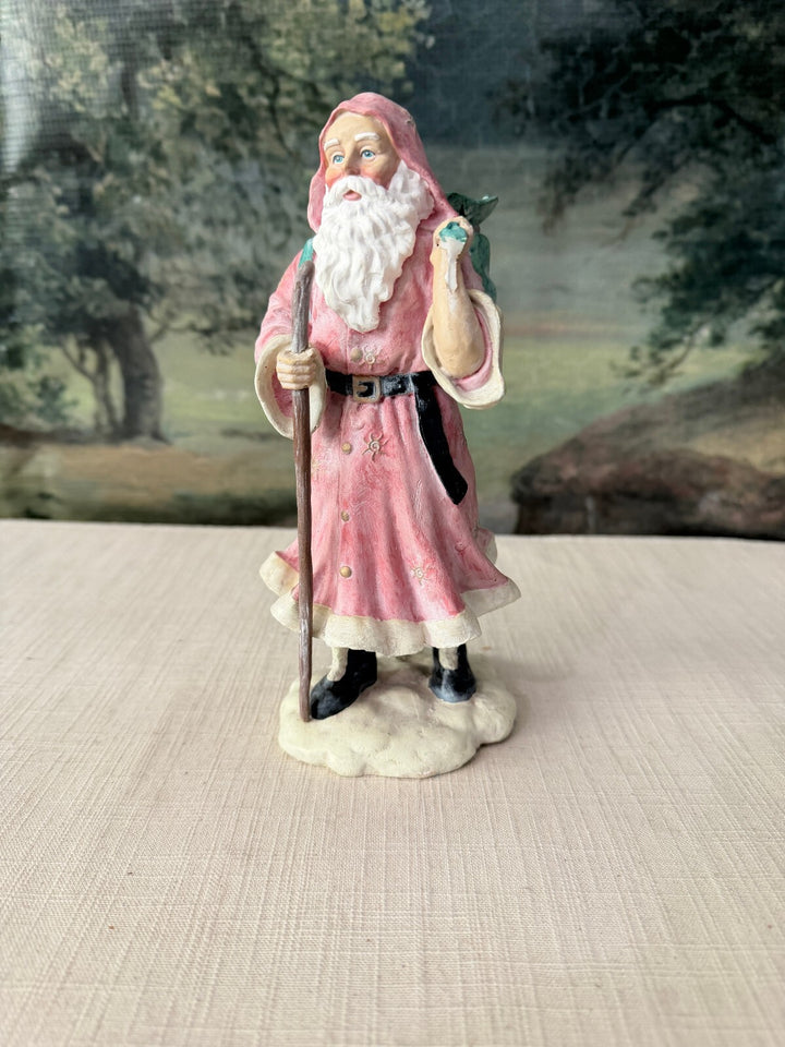 Santa Claus Figurine in Robe with Backpack