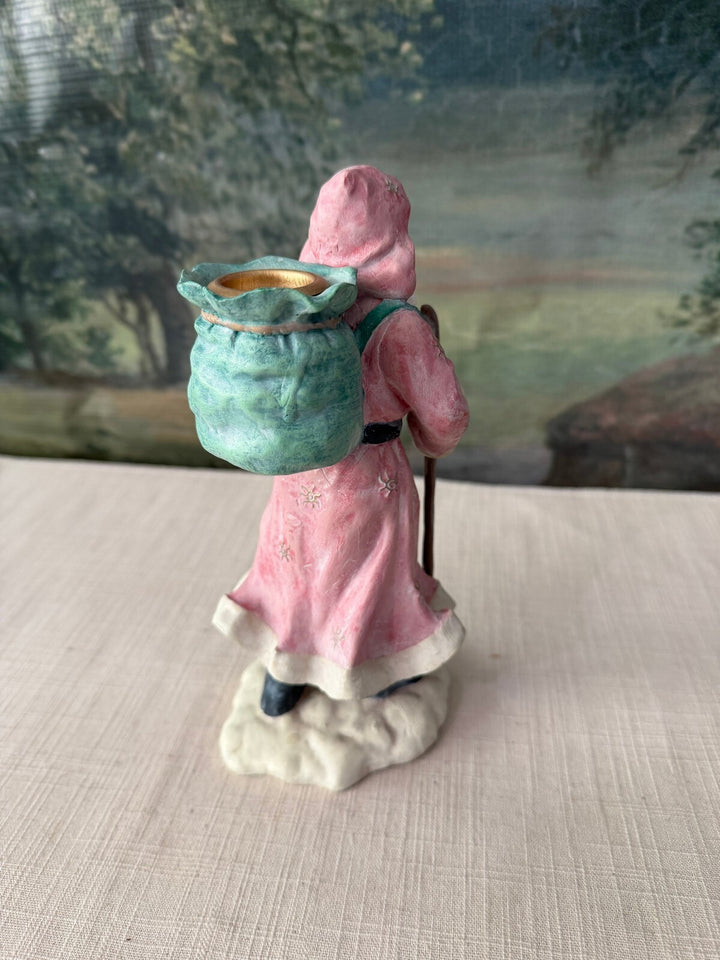 Santa Claus Figurine in Robe with Backpack
