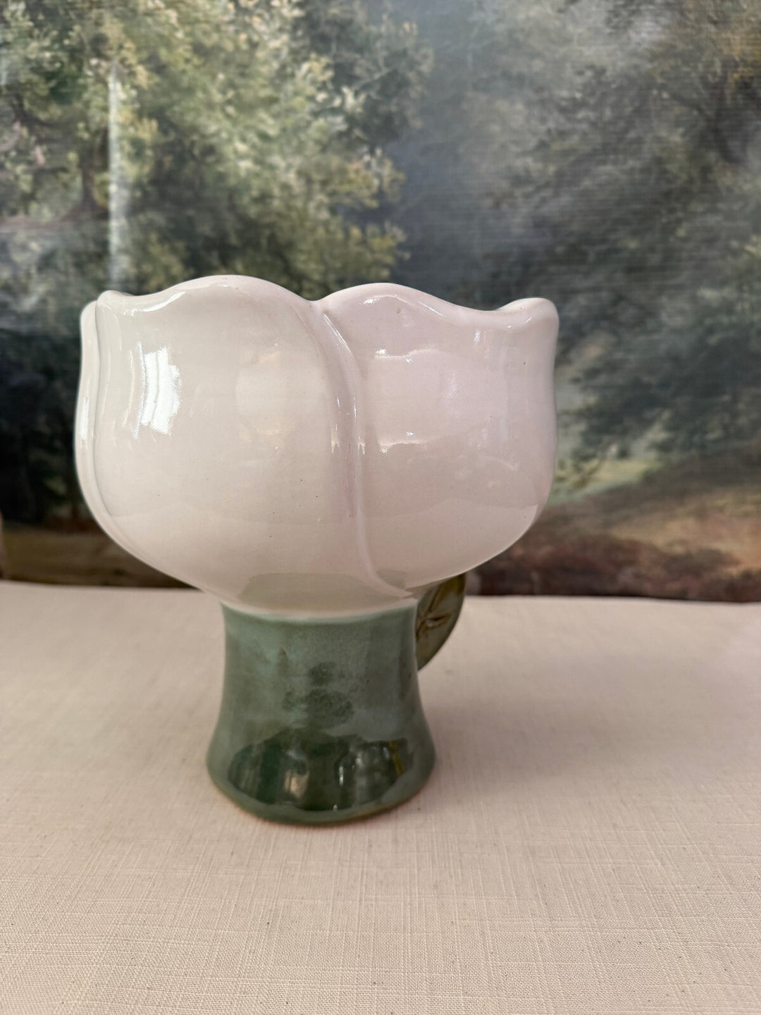 White Flower Form Pottery Vase with Green Pedestal Base